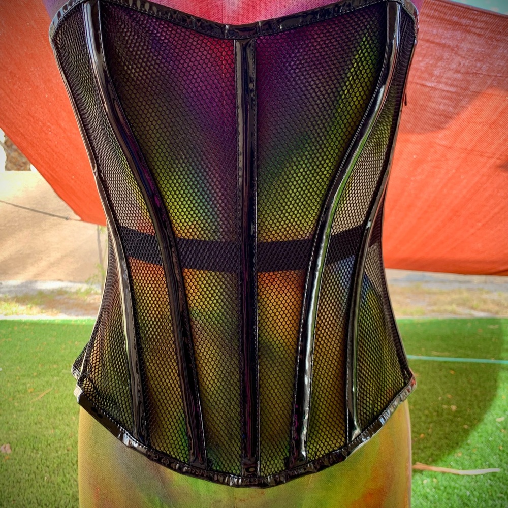Black fishnet and patent corset with black mesh